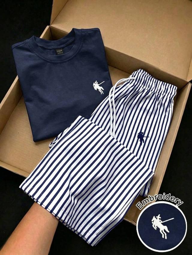 navy striped straight leg pants and embroidered tee