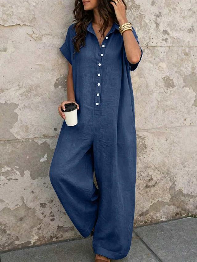 navy blue linen button-front short-sleeve jumpsuit