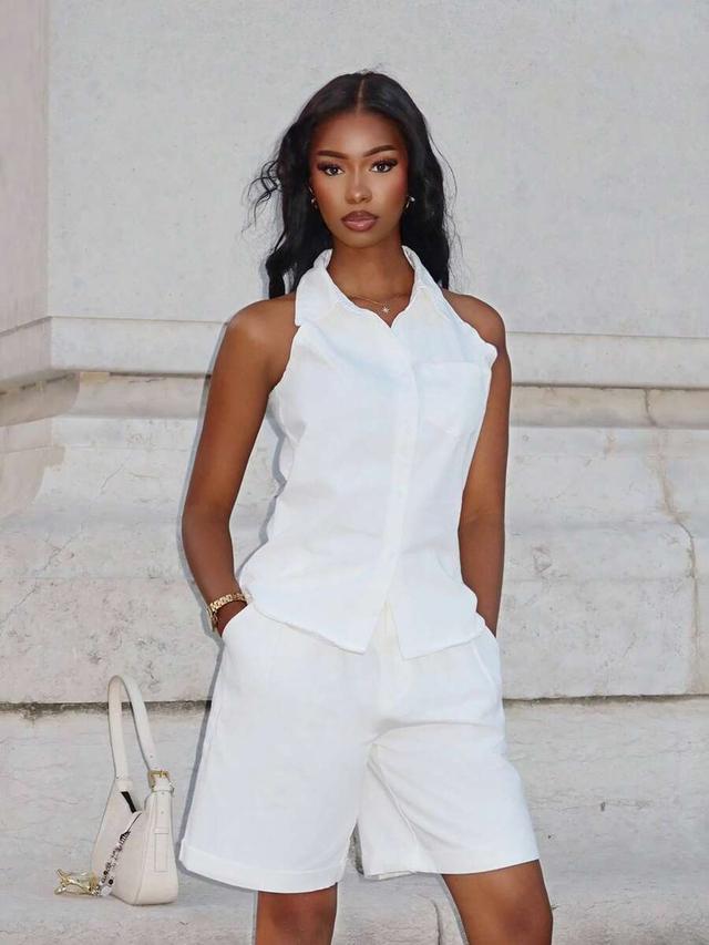 white sleeveless collared shirt and shorts coord set