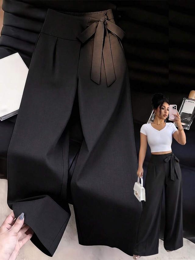 black high-waisted tie-waist wide-leg trousers