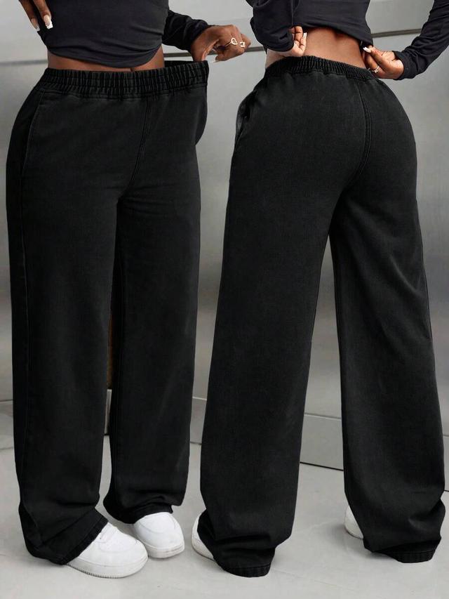black washed denim elastic waist straight leg jeans