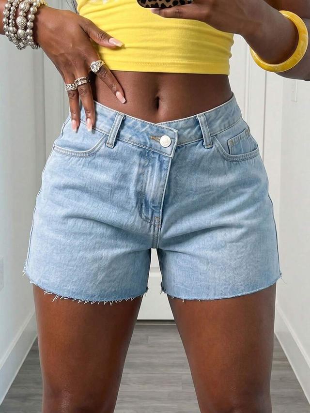 light wash denim shorts with asymmetric button closure