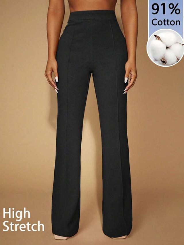 black high-waisted minimalist office trousers