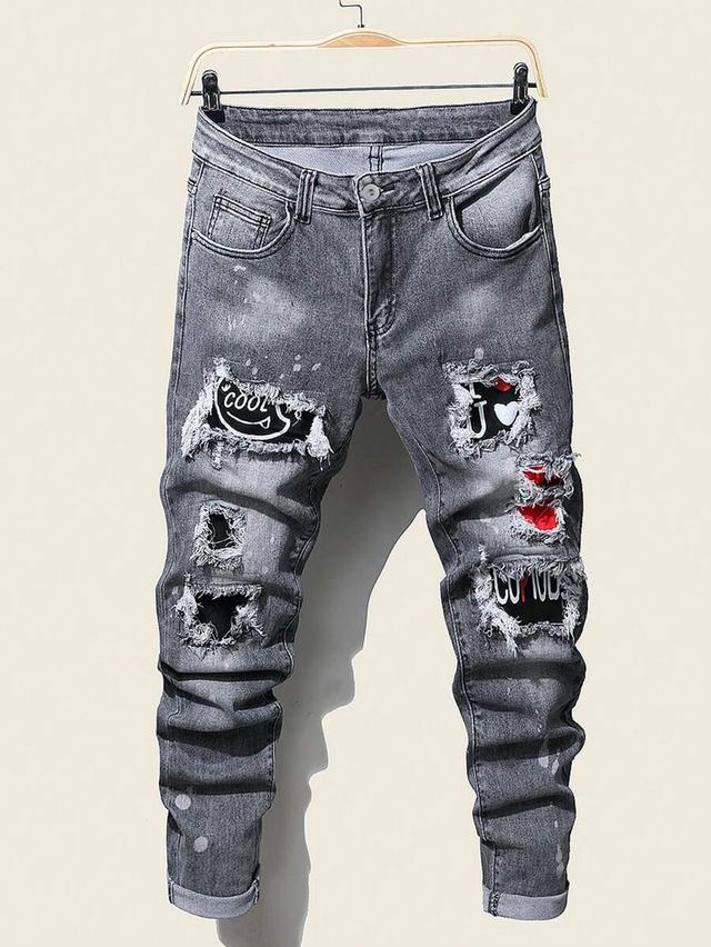 grey cotton denim jeans with letter patches and rips