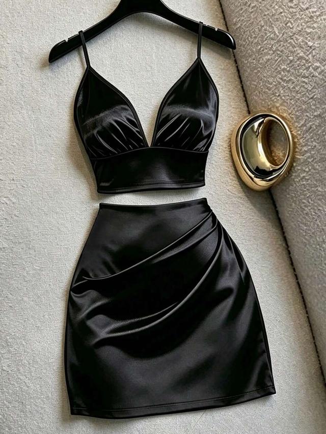 elegant black satin camisole and pleated mini skirt set