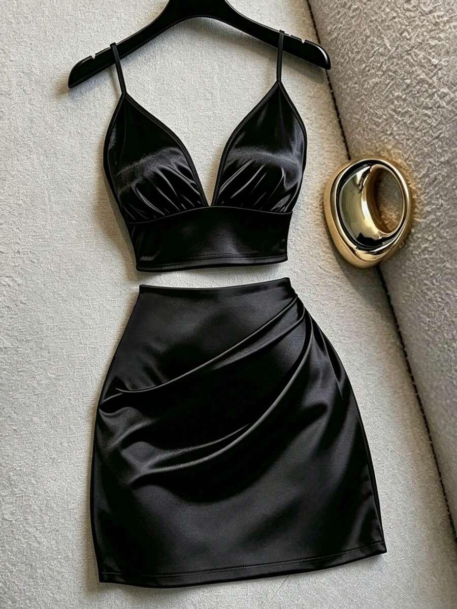 elegant black satin camisole and pleated mini skirt set