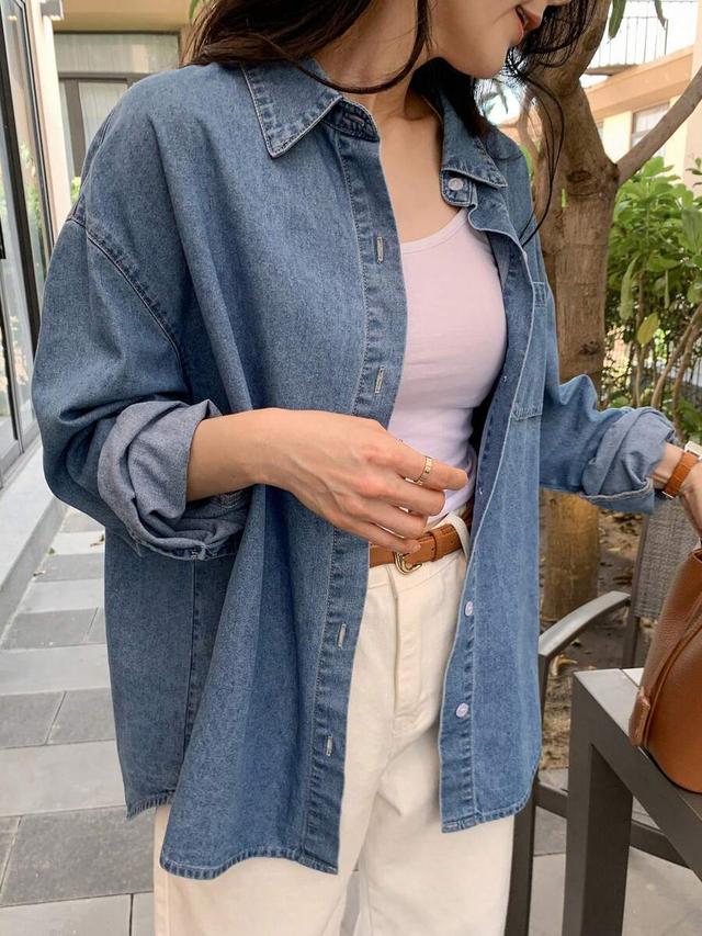 casual loose fitting blue denim button-up shirt