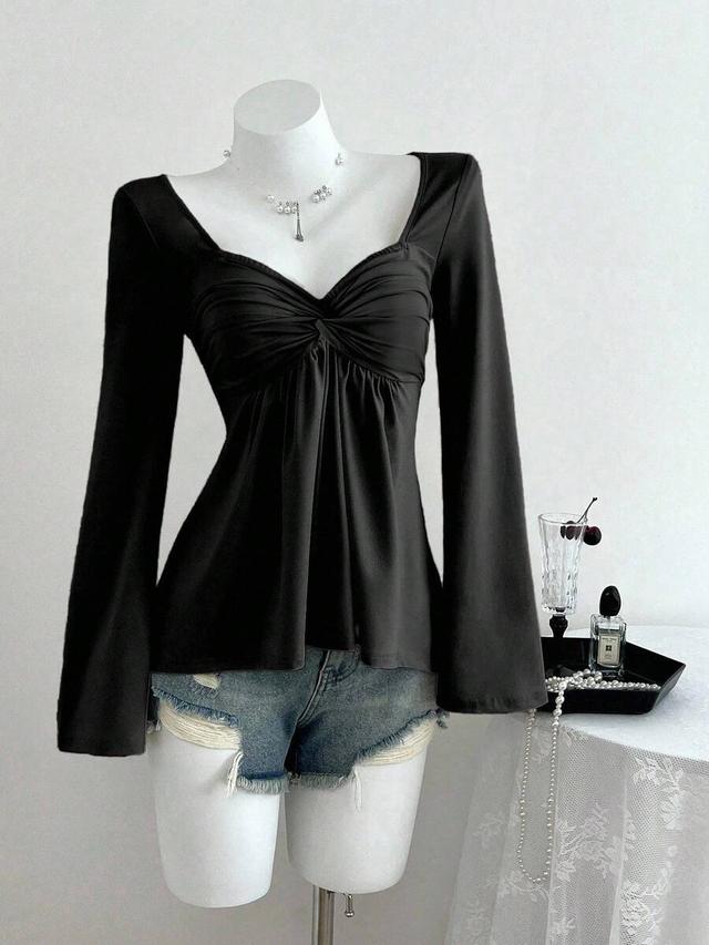 black twist front v-neck long sleeve top