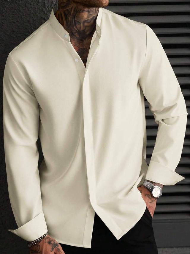 beige long-sleeve henry collar button-up shirt