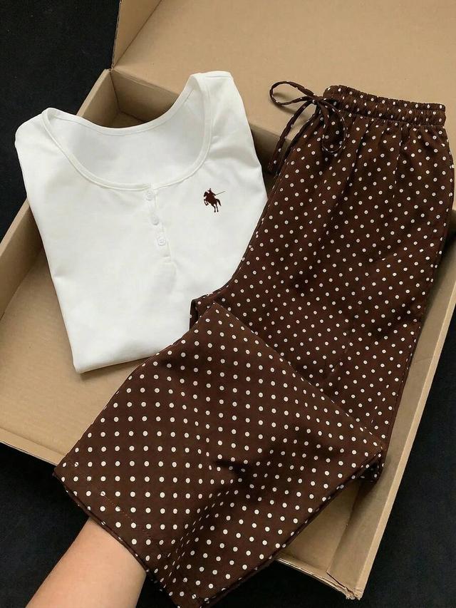 white round neck long sleeve top and polka dot pants
