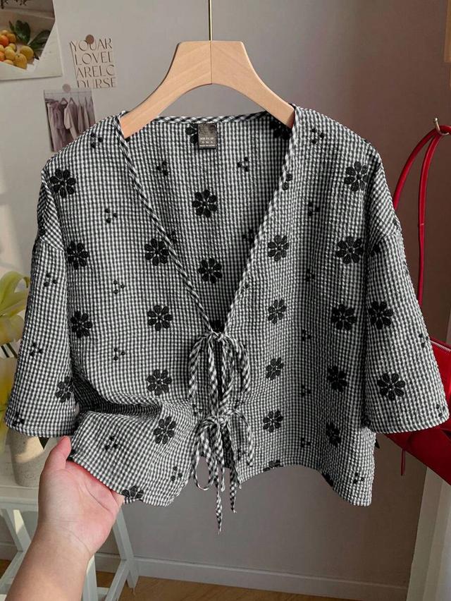 black plaid and floral embroidered v-neck tie-front blouse