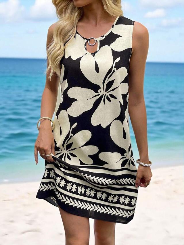 black and cream floral sleeveless vacation shift dress