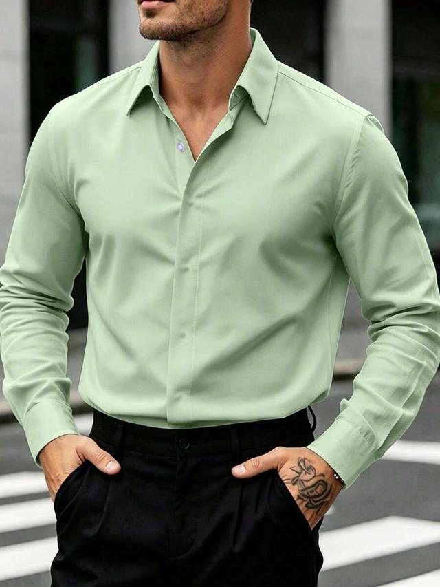 light green long sleeve button-up dress shirt