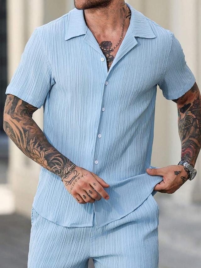 light blue textured short sleeve camp collar shirt