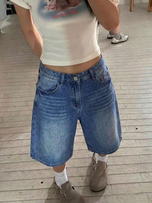 mid-length blue denim bermuda shorts