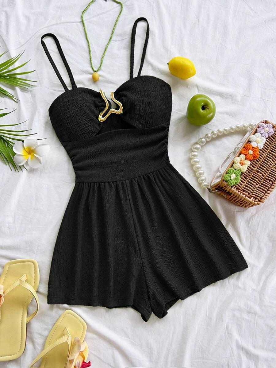 black textured strapless romper with gold hardware detail