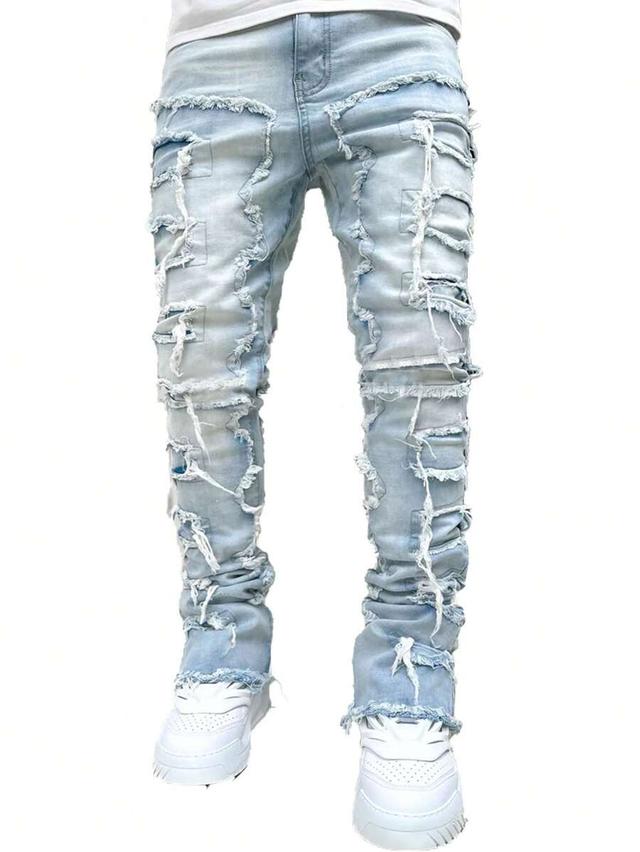 light wash distressed stacked slim fit jeans