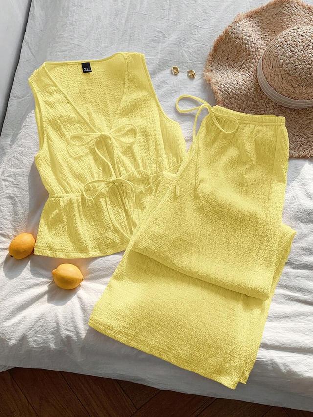 mustard yellow textured front tie sleeveless shirt