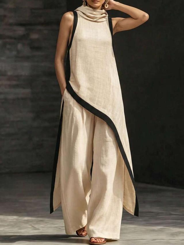 apricot asymmetric sleeveless turtleneck top with black trim