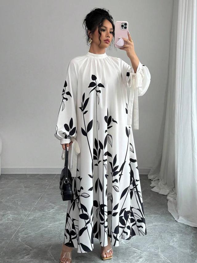 white and black floral print lantern sleeve dress