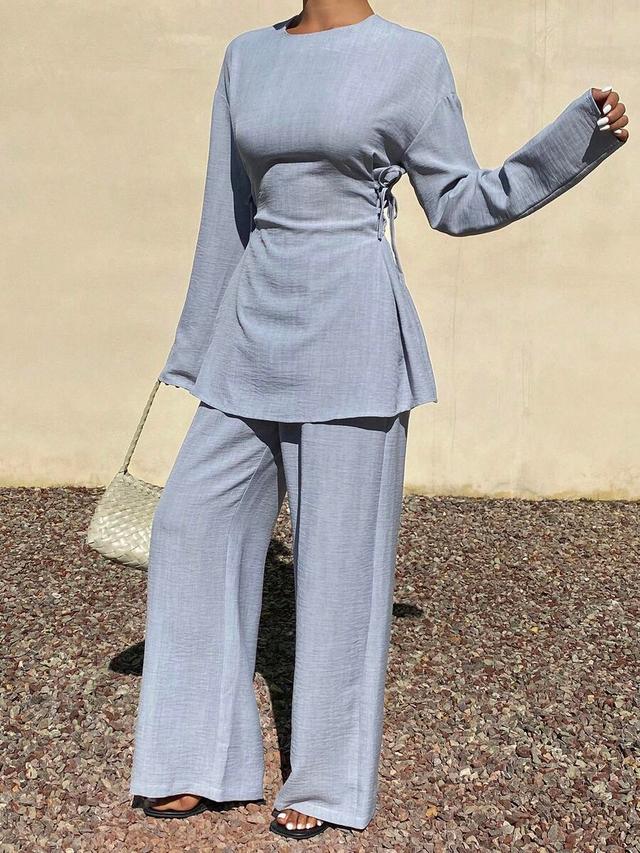 solid color round neck knot design long sleeve top