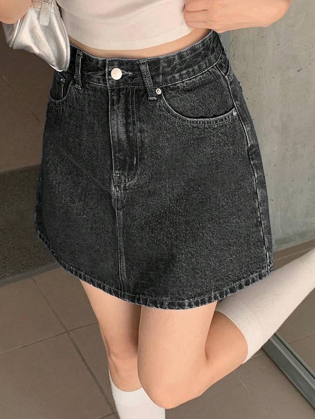 black acid wash denim mini skirt