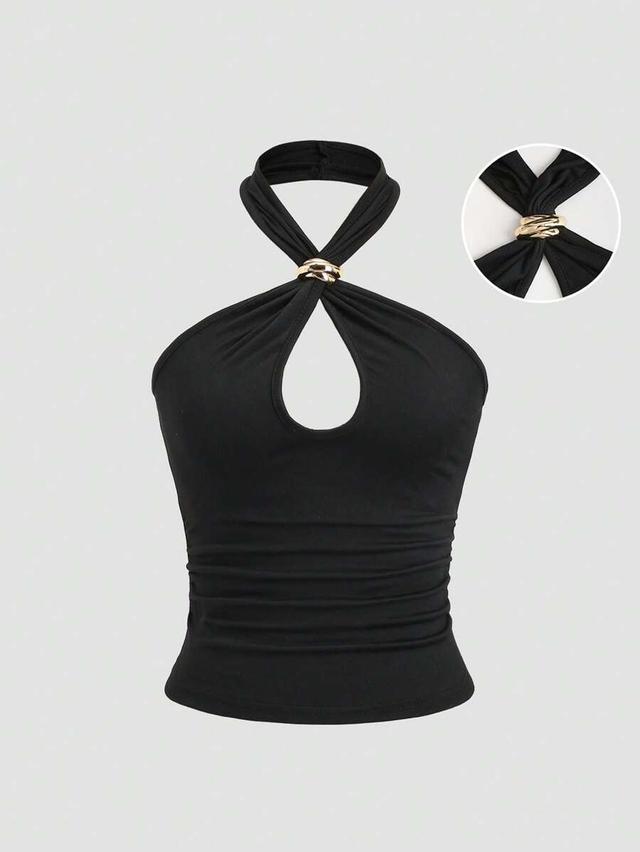 black halter neck fitted top with metal decor