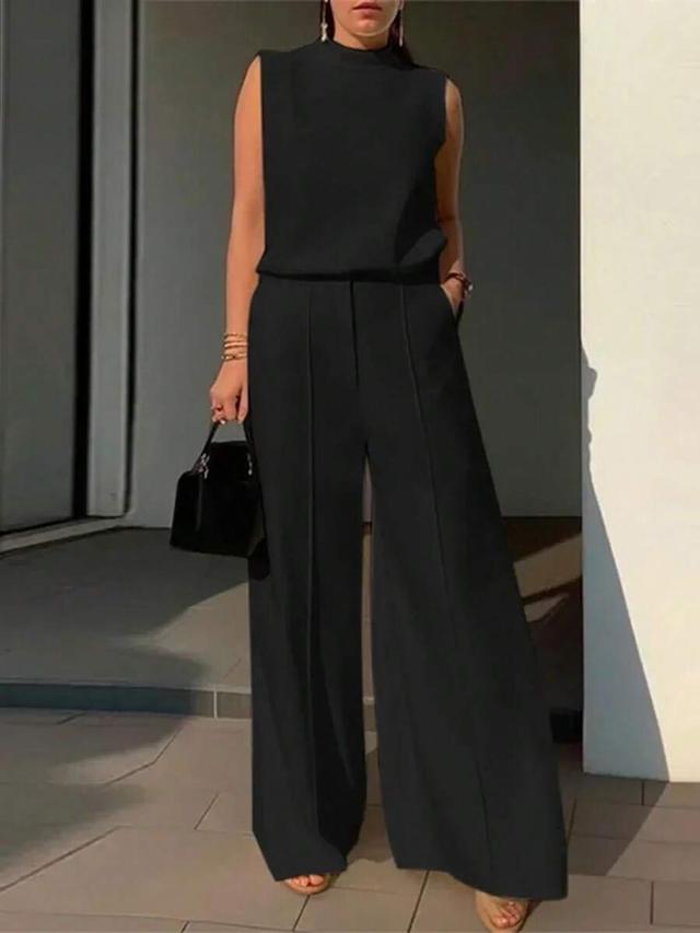 elegant solid black sleeveless camisole and wide leg pants