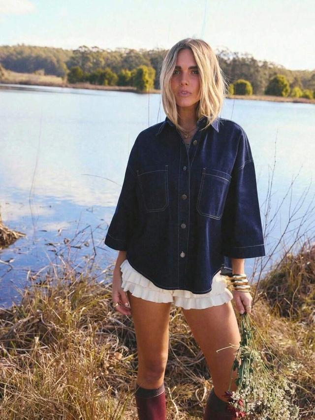 dark indigo denim button-up shirt with contrast stitching