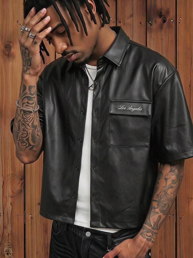 black faux leather short sleeve button up shirt