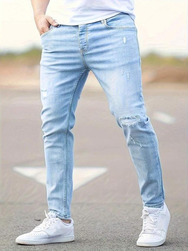 light blue distressed skinny stretch denim jeans