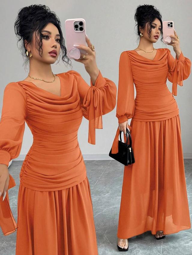 burnt orange chiffon dress with ruched bodice and lantern sleeves