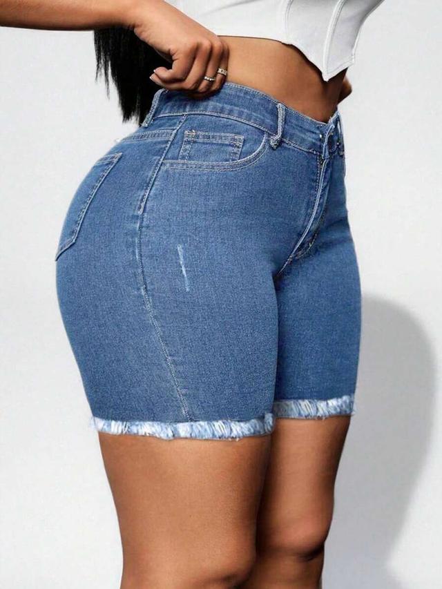 deep blue stretch denim shorts with raw hem
