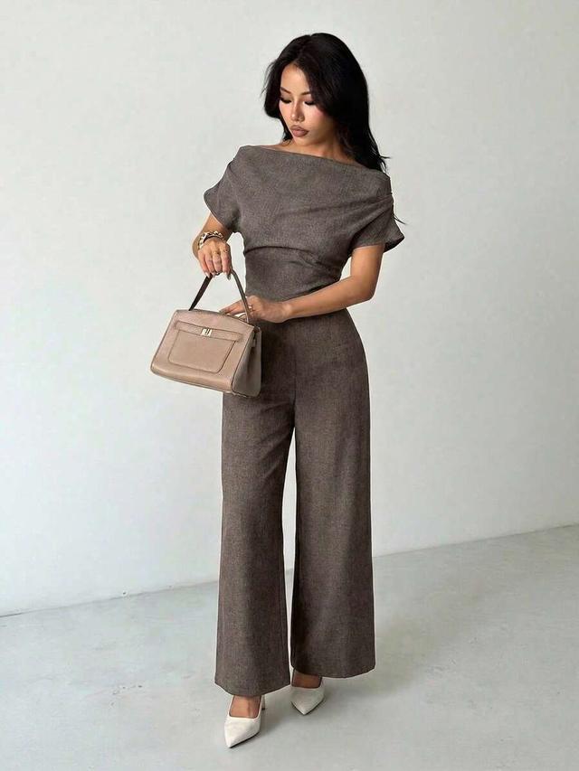 brown linen off-shoulder blouse and wide-leg trousers set