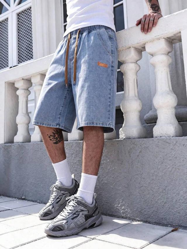 light blue denim bermuda shorts with drawstring