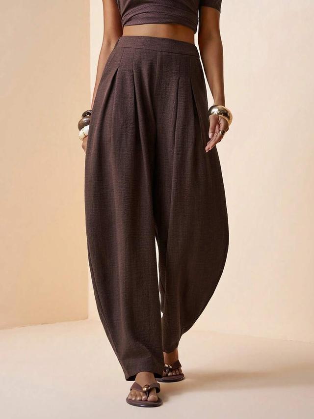brown linen tapered loose fit trousers