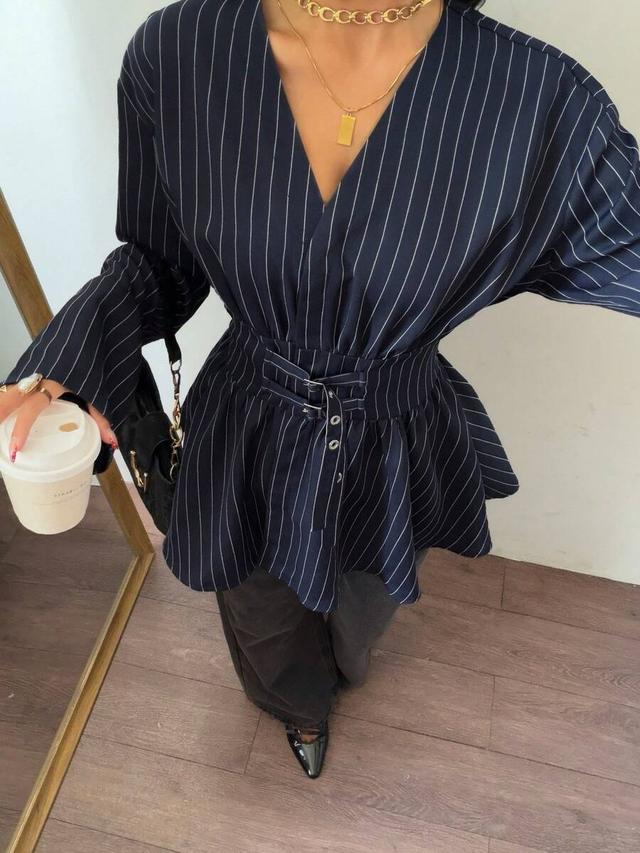 navy blue striped peplum blouse with waist cinching belt