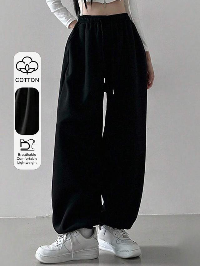 solid black drawstring waist cuffed sports joggers