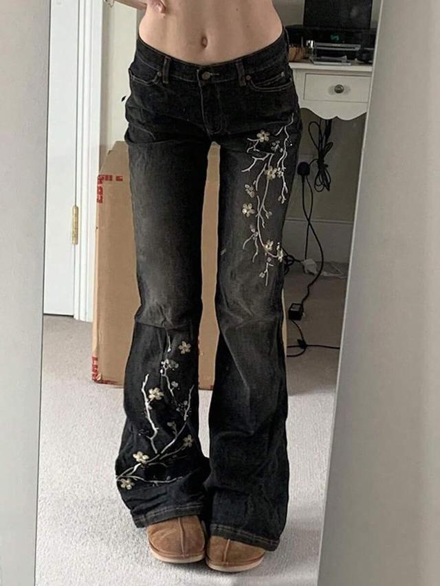 dark wash flared jeans with floral embroidery