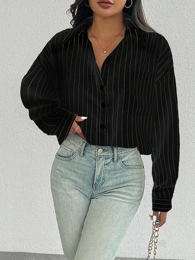 black pinstriped long sleeve button down shirt