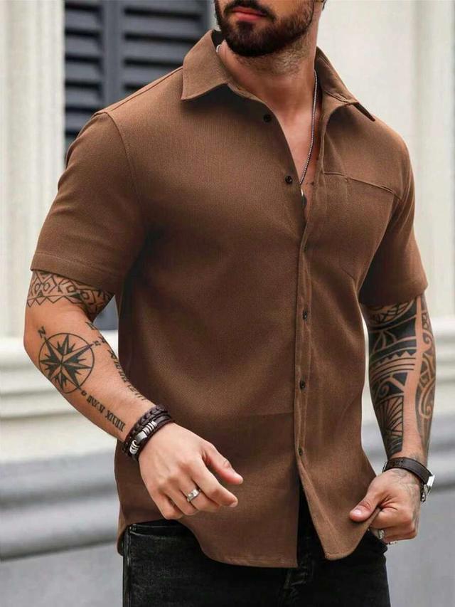 brown short sleeve button down casual shirt