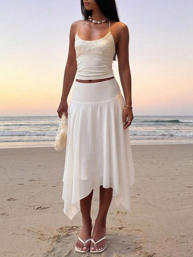 white asymmetrical hem flowy chiffon skirt