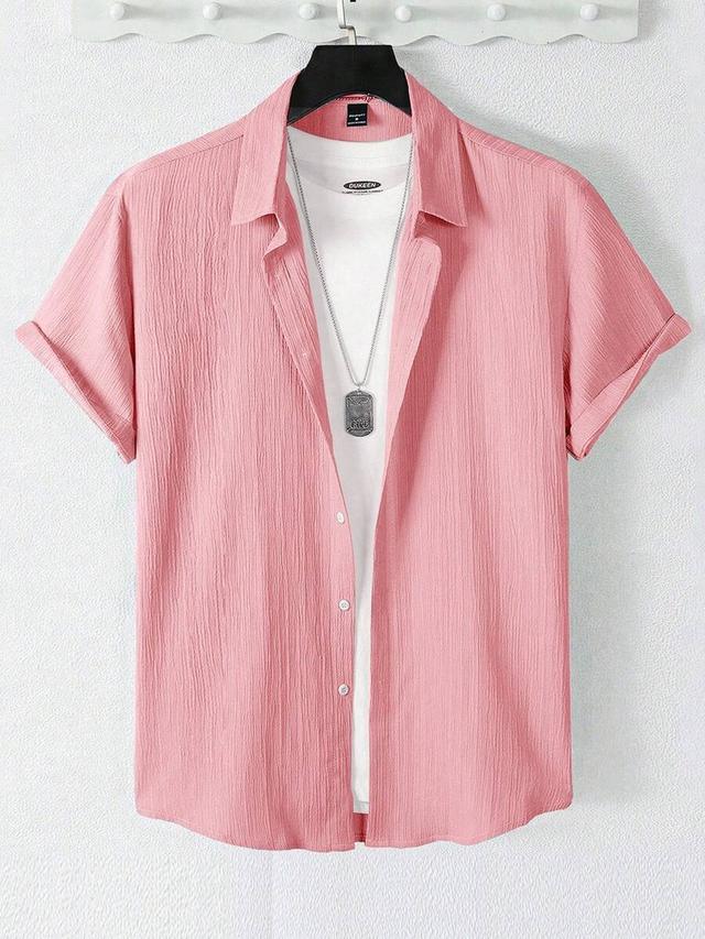 pink textured short sleeve button down shirt
