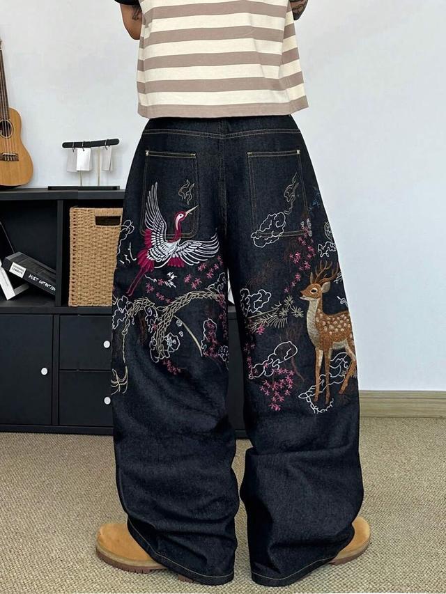 embroidered animal bird graphic black denim jeans