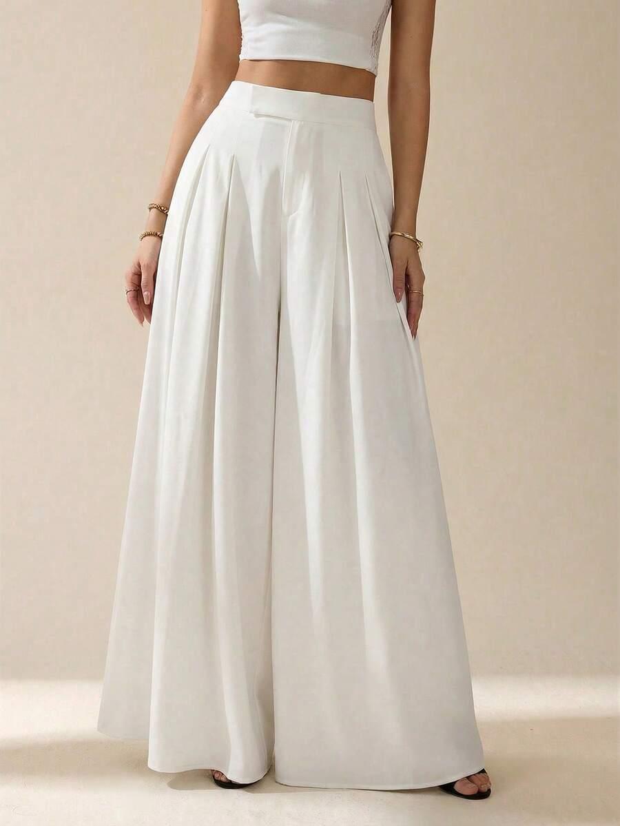 white pleated wide leg trousers