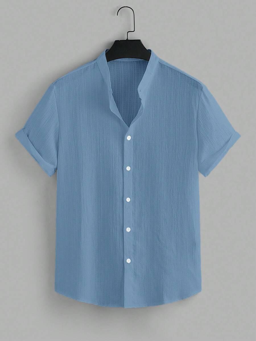 solid blue textured short sleeve button down shirt
