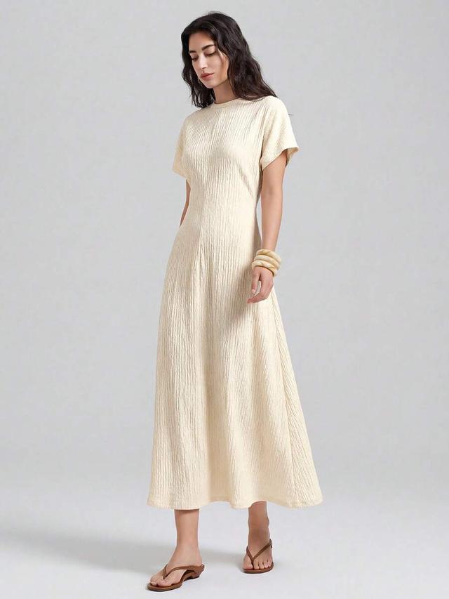 cream textured short sleeve gathered waist a-line dress