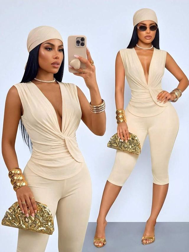 apricot sleeveless jumpsuit with draped twist neck