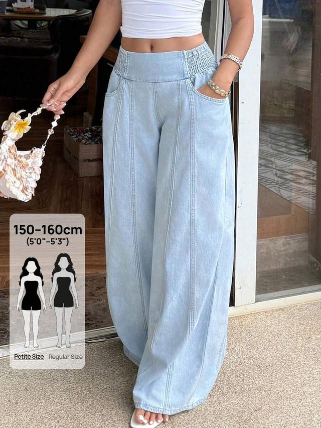 light wash denim wide leg gathered waist jeans