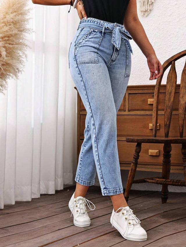 casual light wash denim belted tapered pants